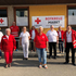 Einige Rotkreuz-Markt-Mitarbeiter stehen vor dem Markt in Kremsmünster