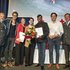 Ehrungsfoto mit Präsident und den Künstler:innen vom Benefizkonzert.