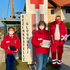 Bezirksstellenleiterin Dr. Patricia Windbrechtinger und Bezirksstellengeschäftsführer Horst Willesberger mit einem Mitarbeiter der Door2Door Mitgliederwerbeaktion