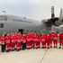 Gruppenfoto vor einer Transportmaschine des Bundesheeres