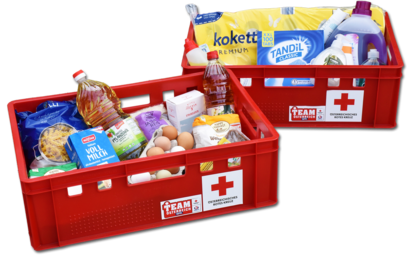Körbe mit Nahrungsmitteln und Hygieneartikeln