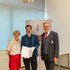 RK-Landesgeschäftsleiter-Stv. Dir. Mag. Thomas Märzinger und RK-Bezirksstellenleiterin Mag. Michaela Schwinghammer-Hausleithner gratulieren Dr. Stephan Mitterhauser zur Beförderung