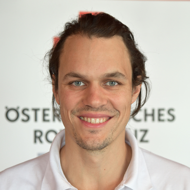 Portraitfoto von Dr. Patrick Heim, Betriebsarzt