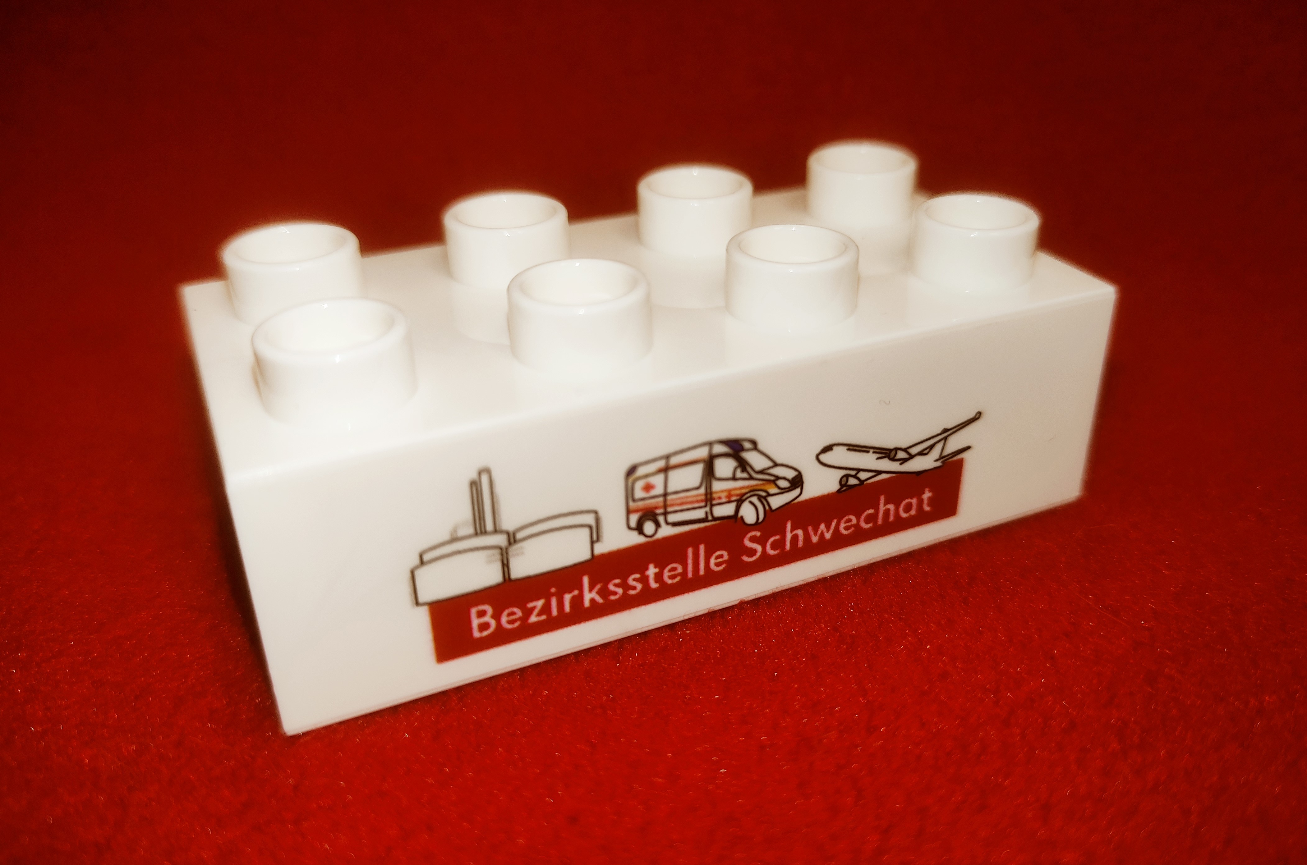 Baustein - © Rotes Kreuz SW / Palkowitz M. Bild eines symbolischen Bausteins